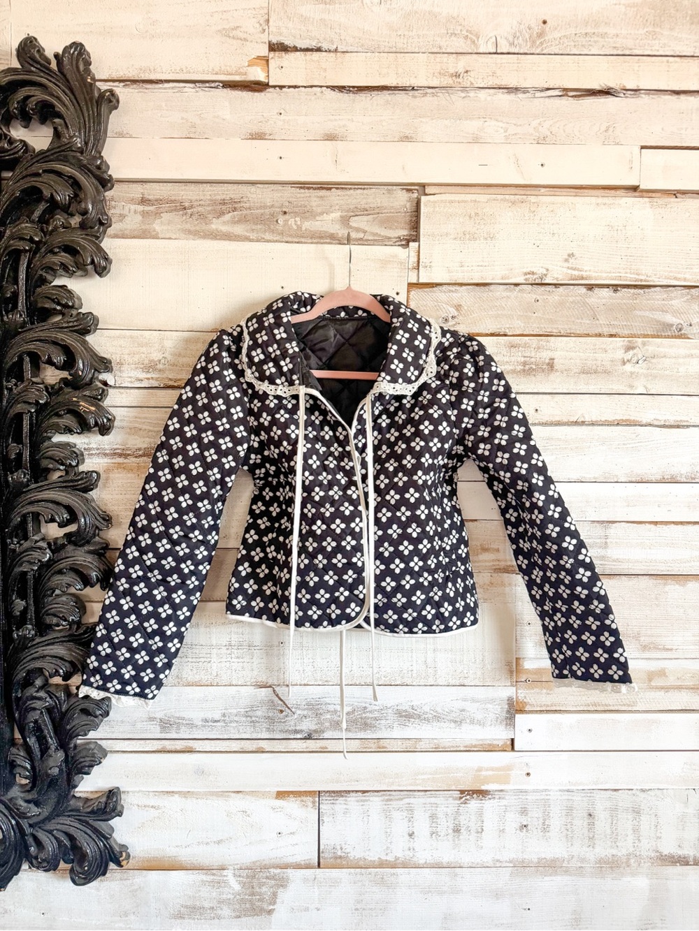 Womens Black Quilted Floral-Print Jacket with White Trim